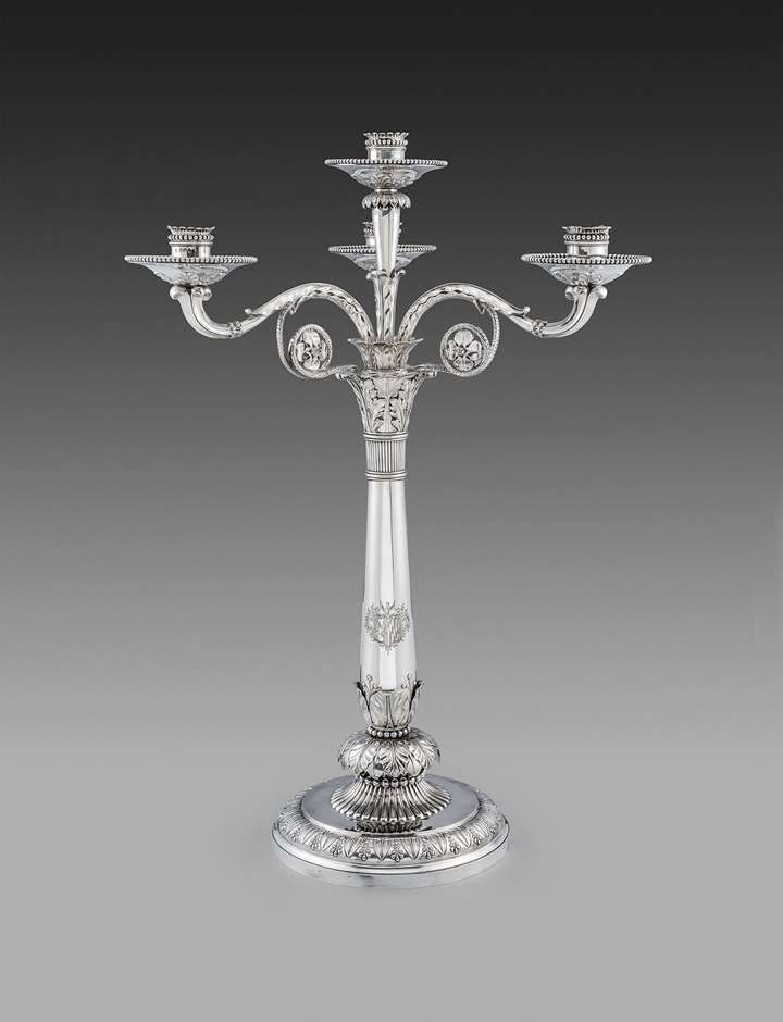 An Elegant George III Four-Light Three Branch Candelabrum
